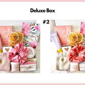 May include: Two gift boxes with a variety of items, including a pink and a lavender hand cream, a pink and a white fluffy sock, a pink and a white hair scrunchie, a pink and a white soap bar, a pink and a white card that says "Happy Mother's Day", and a pink and a white card that says "Cup of Love".