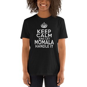 May include: Black t-shirt with white text that reads "Keep Calm and Let Momala Handle It" with a crown graphic above the text.