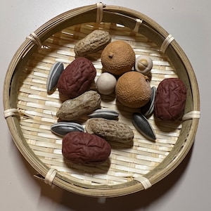Ceramic decoration, sunflower seeds, peanut, date, longan and lotus seeds