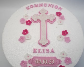 Cake decoration cross with baptism, communion, confirmation made of fondant sugar decoration