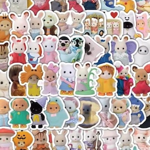 May include: A selection of colourful, die-cut stickers featuring various animal characters in outfits. The stickers include bunnies, bears, cats, and other creatures dressed in costumes and holding accessories. The stickers are in a variety of colours and styles.