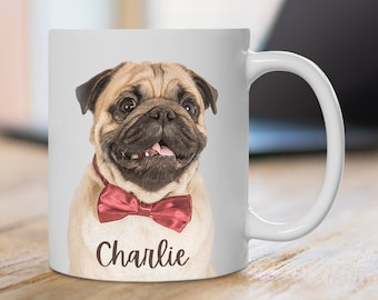 May include: White ceramic mug with a photo of a pug wearing a red bow tie. The mug has the text "Charlie" printed on the bottom.