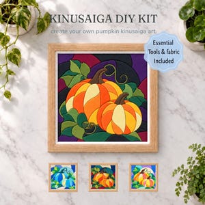 May include: A Kinusaiga DIY kit featuring a framed square art piece of two orange and yellow pumpkins with green leaves against a dark purple background. Three smaller versions of the pumpkin art in blue, orange, and yellow color schemes are below.