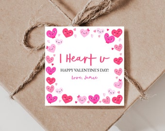 May include: A pink and white Valentine's Day gift tag with a heart border and the text "I Heart u" and "Happy Valentine's Day! Love, Jamie".
