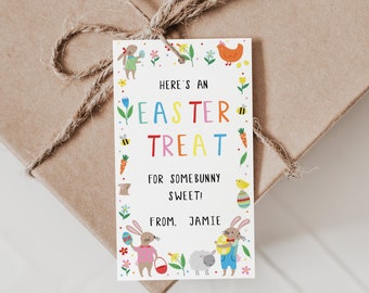Könnte beinhalten: Weißer Geschenkanhänger mit bunten Illustrationen zum Thema Ostern. Der Anhänger lautet "Here's an Easter Treat for somebunny sweet! From. Jamie".