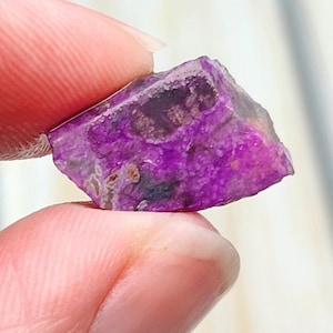 May include: A set of three ceramic mugs with a speckled, matte finish. The mugs are in shades of cream, light brown, and dark brown. Each mug has a simple, minimalist design, perfect for coffee or tea.