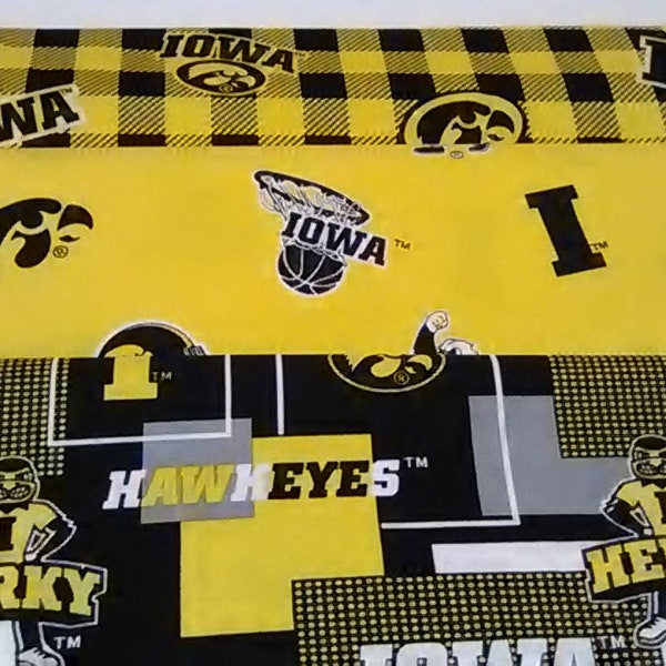 NCAA - University of Iowa (Hawkeyes) Team Fabric Sold By (1/2,  18" x 44")