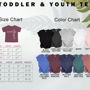 May include: A product image displaying a size and color chart for toddler and youth tees. The size chart shows measurements in inches and weight in pounds. Color options include black, gray, white, pink, blue, maroon, navy, teal, and mauve.