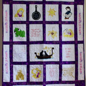 May include: A purple and white quilt with embroidered images from the Disney movie Tangled. The quilt features characters like Rapunzel, Flynn Rider, Pascal the chameleon, and the sun. It also includes text from the movie, such as "At last... I see the lights" and "Happily Ever After".