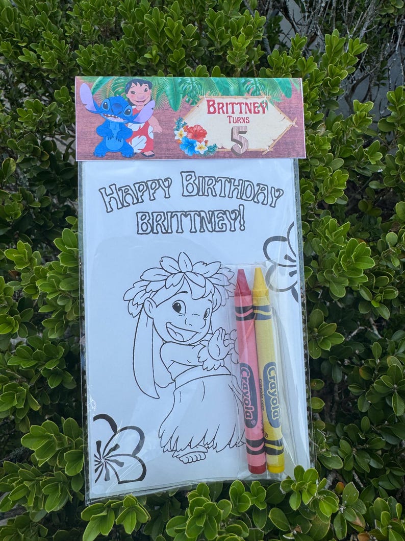 May include: A birthday coloring set featuring a Lilo & Stitch theme. The set includes a coloring page with a Lilo character, two crayons, and a banner that reads "Happy Birthday Brittney!" and "Brittney Turns 5".