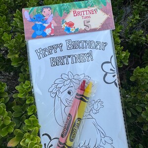 May include: A clear plastic bag containing a coloring page and two crayons. The coloring page features a cartoon character and the text "Happy Birthday Brittany!" A banner at the top reads "Brittney Turns 5".