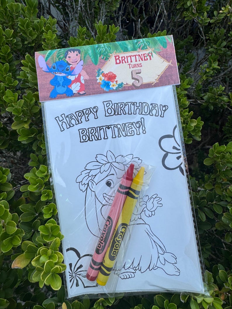 May include: A clear plastic bag containing a coloring page and two crayons. The coloring page features a cartoon character and the text "Happy Birthday Brittany!" A banner at the top reads "Brittney Turns 5".