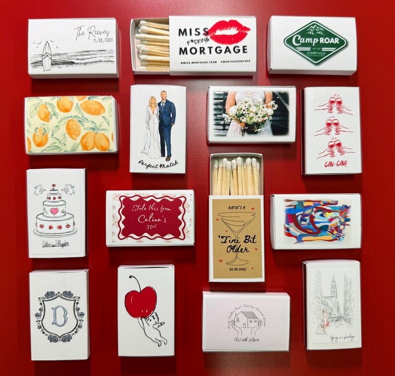 a red wall covered in lots of different types of cards