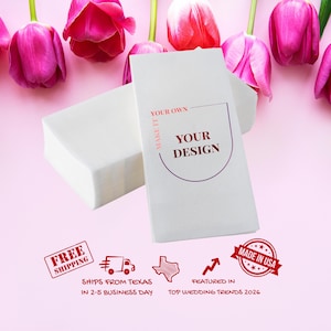 May include: White rectangular product packaging with the text "YOUR DESIGN" on a pink background, surrounded by pink tulips. The packaging is accompanied by a stack of white rectangular items. The image also includes the text "MADE IN USA".