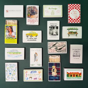 a collection of business cards and magnets on a wall