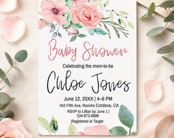 May include: A rectangular baby shower invitation card featuring watercolor pink flowers and green leaves at the top and bottom. The text reads: Baby Shower, Celebrating the mom-to-be, Chloe Jones, June 12, 20XX | 4-6 PM, 342 Fifth Ave, Rancho Cordova, CA, RSVP to Lillian by June 1 | 334-673-9986, Registered at Target.