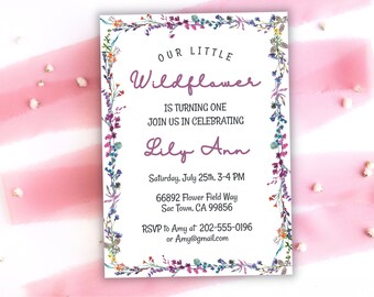 May include: A white invitation card with a floral border in shades of purple, blue, and orange. The text reads "Our Little Wildflower is Turning One" and invites guests to celebrate Lily Ann's birthday on July 25th. Includes RSVP information.