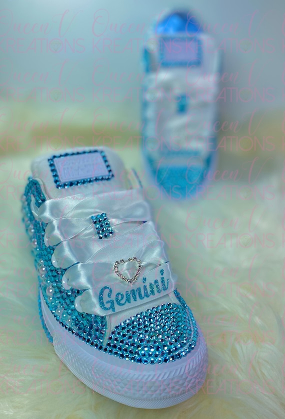 Aqua chuck taylors best sale