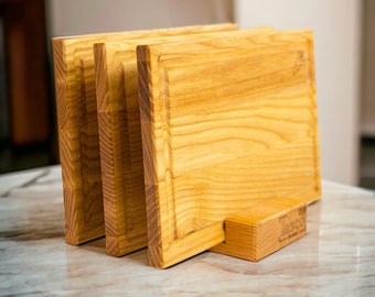 Wooden cutting boards, set of three 2-sided boards on a stand