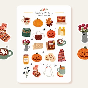 May include: A sheet of "happy stickers" by Och Monika with autumn-themed illustrations. Includes pumpkins, socks, mugs of cocoa, a ghost, a laptop, and other fall-related images. The stickers are colourful and whimsical.