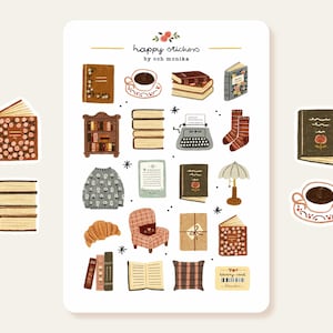 Può includere: Un foglio di adesivi con illustrazioni di libri, una macchina da scrivere, tazze di caffè, calzini e altri oggetti accoglienti. Il testo "happy stickers by ooh monika" è in alto. Gli adesivi sono in una calda tavolozza di colori.