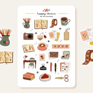 May include: A sheet of stickers with a variety of illustrations, including a camera, teacup, open book, and pencils in a vase. The stickers have a hand-drawn style with a soft color palette and the text "happy stickers by och monika".