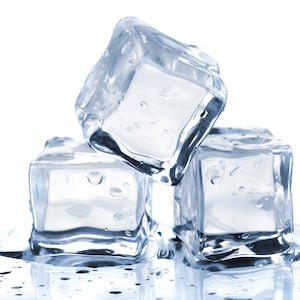 May include: Three clear ice cubes on a white background. The ice cubes are melting and there are water droplets on the surface.