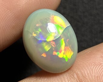 Ethiopian Opal Cabochon Ethiopian Opal Gemstone Top Beautiful Red GreenFull Flashy MULTI Fair Opal Size 11.5x9.5 MM For Ring Pendant Use