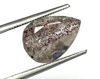 Pierre gemme Super 7, pierre naturelle de taille Super Seven, pierre mélodie, pierre gemme lépidocrocite de qualité AAA+ en vrac. 14 x 10 mm. 4,80 carats.