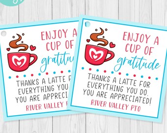 May include: Two blue and white gift tags with a red coffee cup and steam design. The text on the tags reads "Enjoy a cup of gratitude" and "Thanks a latte for everything you do. You are appreciated!" The tags also include the text "River Valley PTO".