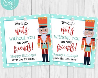 May include: Two gift tags with a light blue background and white polka dots. Each tag features a cartoon nutcracker soldier and the text "We'd go nuts without you as our friends! Happy Holidays FROM the Johnsons."