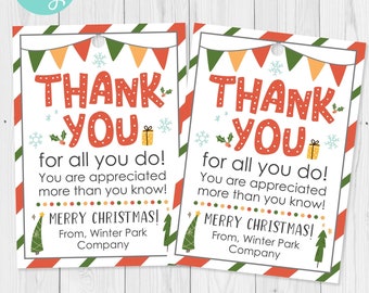 May include: Two Christmas-themed gift tags with a white background and red and green diagonal stripes. The tags read "THANK YOU" in large, orange letters, with the message "MERRY CHRISTMAS!" and the company name.