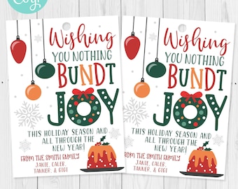 May include: Two white gift tags with the text "Wishing You Nothing Bundt Joy" in red, green, and orange. The tags feature festive illustrations of ornaments, snowflakes, and a bundt cake. The text "This Holiday Season and All Through the New Year!" is also included.