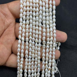 Natural Fresh Water Pearls Smooth Rice Shape Beads    4-5mm Rice Shape Water Pearl Beads    13 Inch White Pearl Beads    Smooth Water Pearls