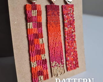 May include: Three pairs of long, beaded earrings in red, orange, and gold. The earrings are hanging from a brown card with the word "PATTERN" printed on it.