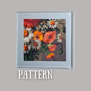 May include: A square glass coaster with a floral design created from small, colourful beads. The pattern features red, orange, and white flowers. The word "PATTERN" is printed in white at the bottom of the coaster.
