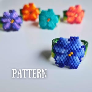 May include: A collection of beaded flower rings in various colors, including blue, orange, and turquoise. The rings feature a floral design with a yellow center and a green band. The word "PATTERN" is displayed in white text.