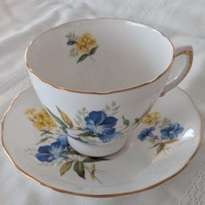 Queen Anne Tea cup & saucer set-- blue and yellow flowers, gold edged -- Ridgway Potteries Limited, Made in England
