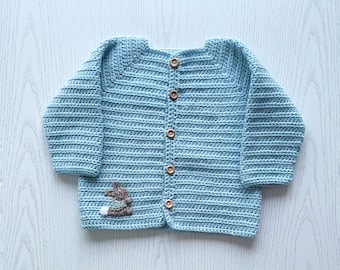 Blue baby cardigan, bunny motif, wooden effect buttons