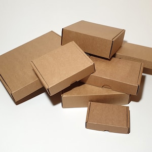 Shipping boxes with lid, made from cardboard, durable and easy to fold, different sizes