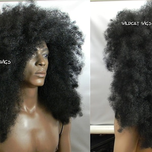 HUGE AFRO WIG .. Great for a party or Halloween, etc.  Unisex wig! Goes Down your back! Top Seller