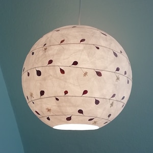 Round lampshade plants pressed flowers and leaves