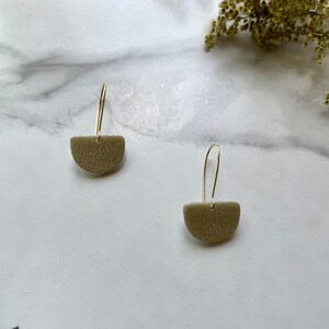 Gold glittery dangling half moons - polymer clay earrings
