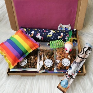 A cat gift box which contains treats and handmade strong smelling catnip toys which cats will love