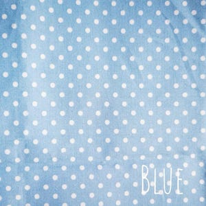 A blue fabric with white polka dots. The word 'BLUE' is written in white text at the bottom of the image.