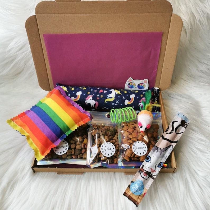 A cat gift box which contains treats and handmade strong smelling catnip toys which cats will love