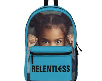 May include: A blue backpack with a girl's face peeking out from the top. The backpack has a front pocket with a black zipper and the word "RELENTLESS" printed in black letters.