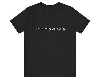 May include: Black t-shirt with the word "CHROMIES" written in a stylized font, similar to the "Friends" logo.