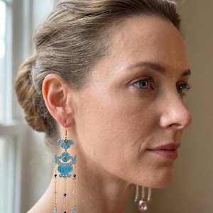 May include: A white ceramic mug with a black handle and the text "But First, Coffee" in a black, bold font. The mug is on a white surface. The mug is 4 inches tall.