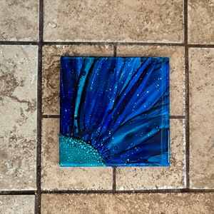 Aqua blue flower drink coaster, hand painted with alcohol inks on 4-1/4 inch ceramic tile